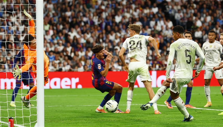 ريال مدريد وبرشلونة (رويترز) 