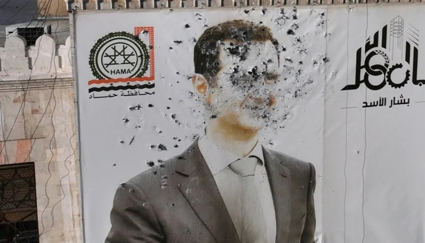 صورة للأسد بعد سقوط نظامه (أرشيف)
