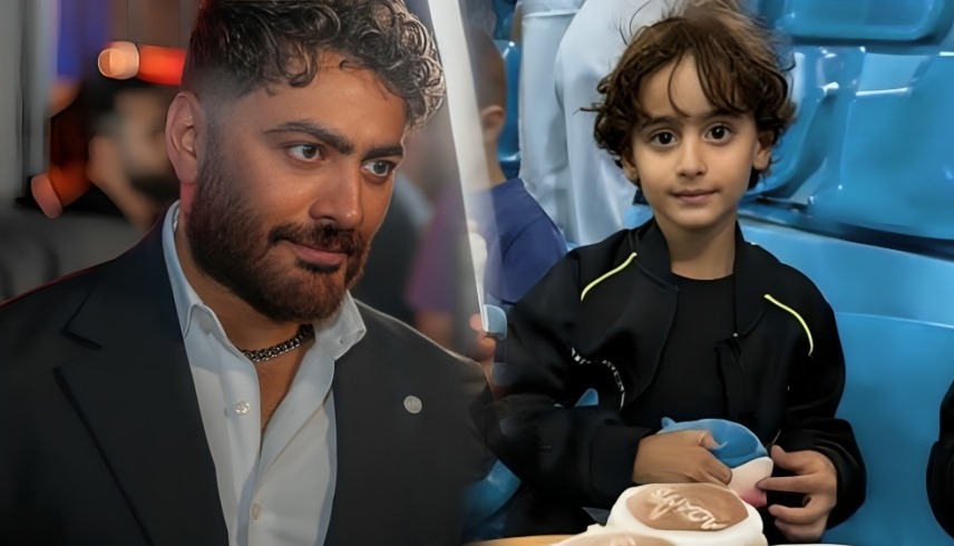 تامر حسني ونجله آدم (أرشيفية)