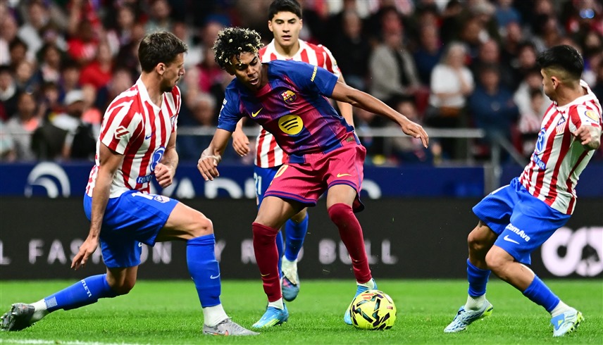 برشلونة وأتلتيكو مدريد (رويترز)