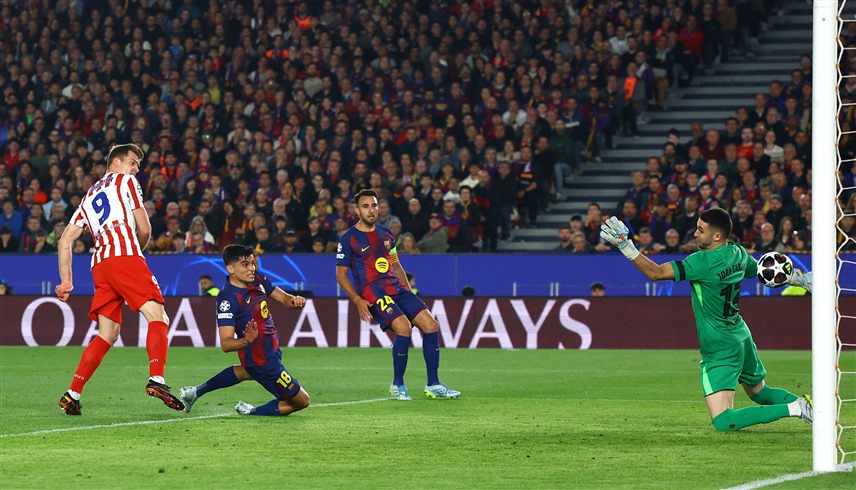 برشلونة وأتلتيكو مدريد (رويترز) 